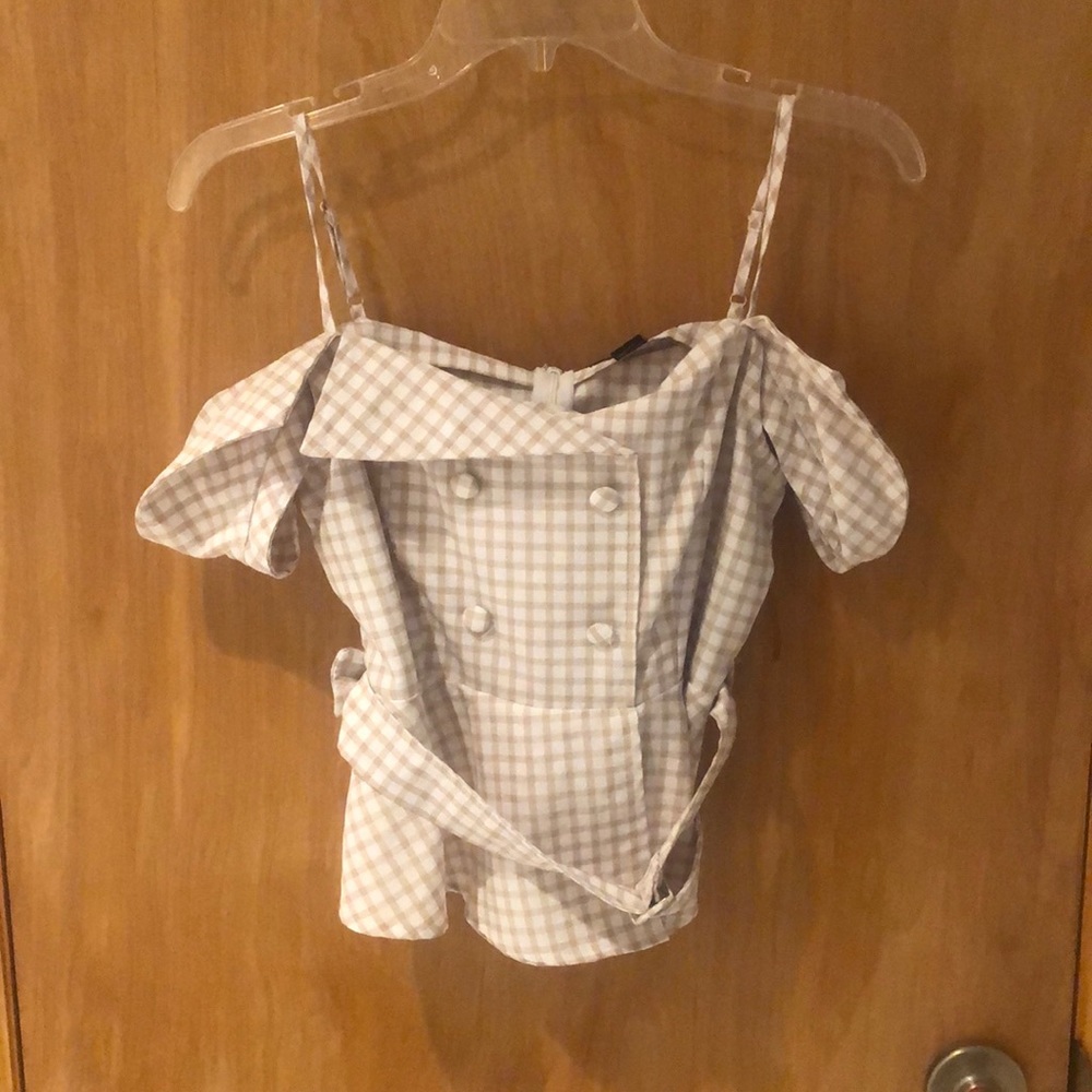 Spaghetti strap Off the shoulder blouse.